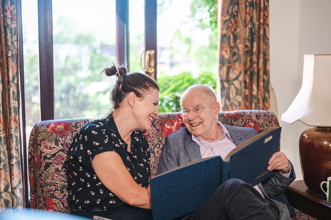 A social worker helping a family with paperwork