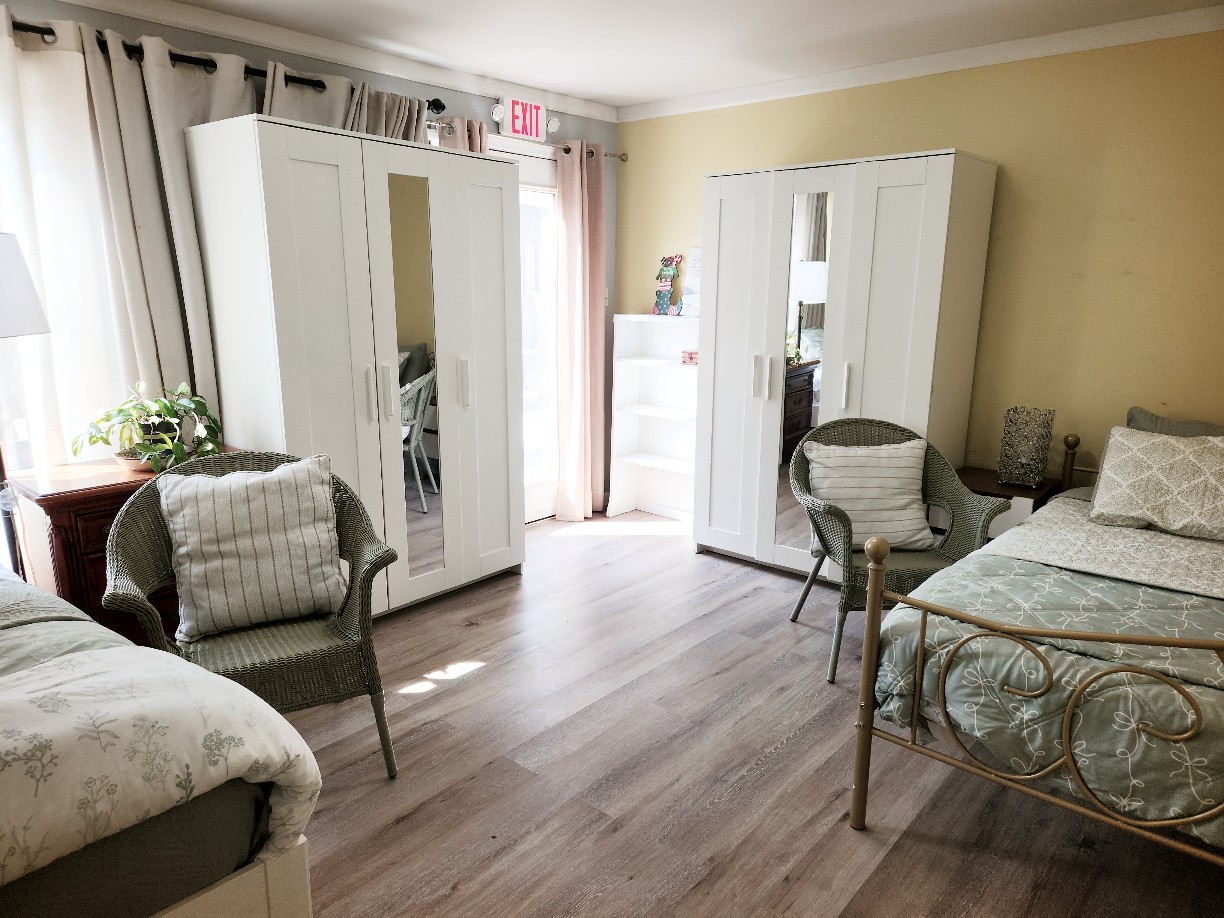 Shared Room 2, spacious with two beds and bright natural light